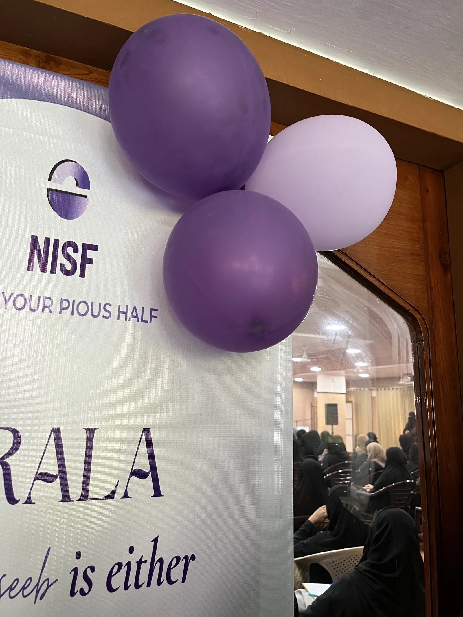 Purple and lilac at the entrance to MSS Auditorium.