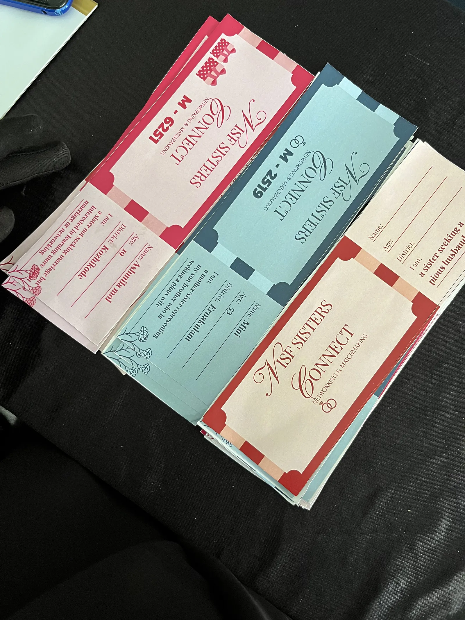 Colour-coded entry tickets, one set per sister.