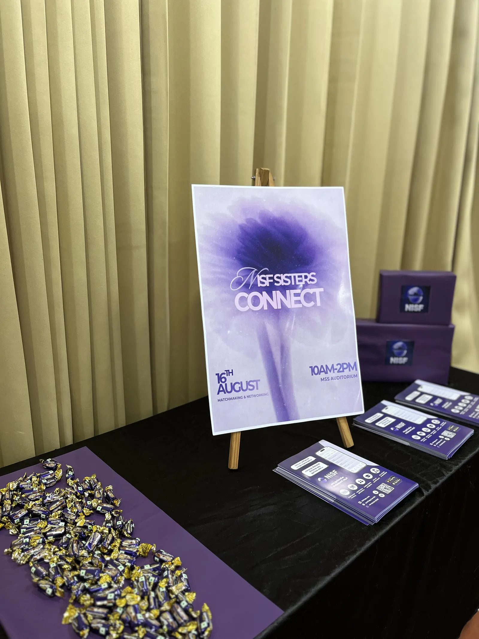 The welcome table, with the day's programme and a Nisf pouch for every sister.